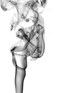 Grayish black smoke vapors wafting upward on a white background