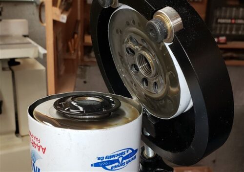 Image of an oil filter with the top cut off