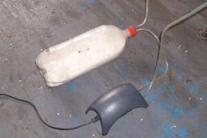 desicant in a 2-liter bottle with a return air line threaded through the cap