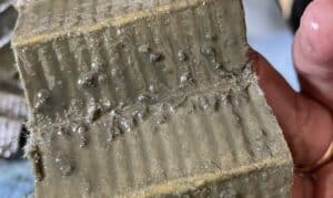 oil filter pleats with slimy lumps in it