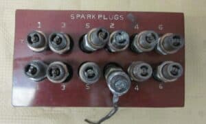 Spark plugs packed with melted material