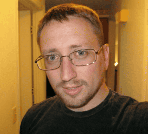Image of coder and senior analyst Travis
