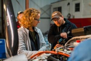 Kristin and Travis looking inside the cylinders with a borescope in the Rotax engine on Ryan's RV-12