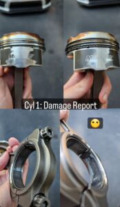 Close up of burned pistons and scored bearings