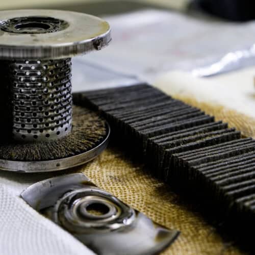 A section of oil filter pleats and the canister from which they were taken.