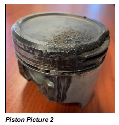 Another image of the Jimmy's corroded top of the burned piston. Be glad your pistons don't look like this. 