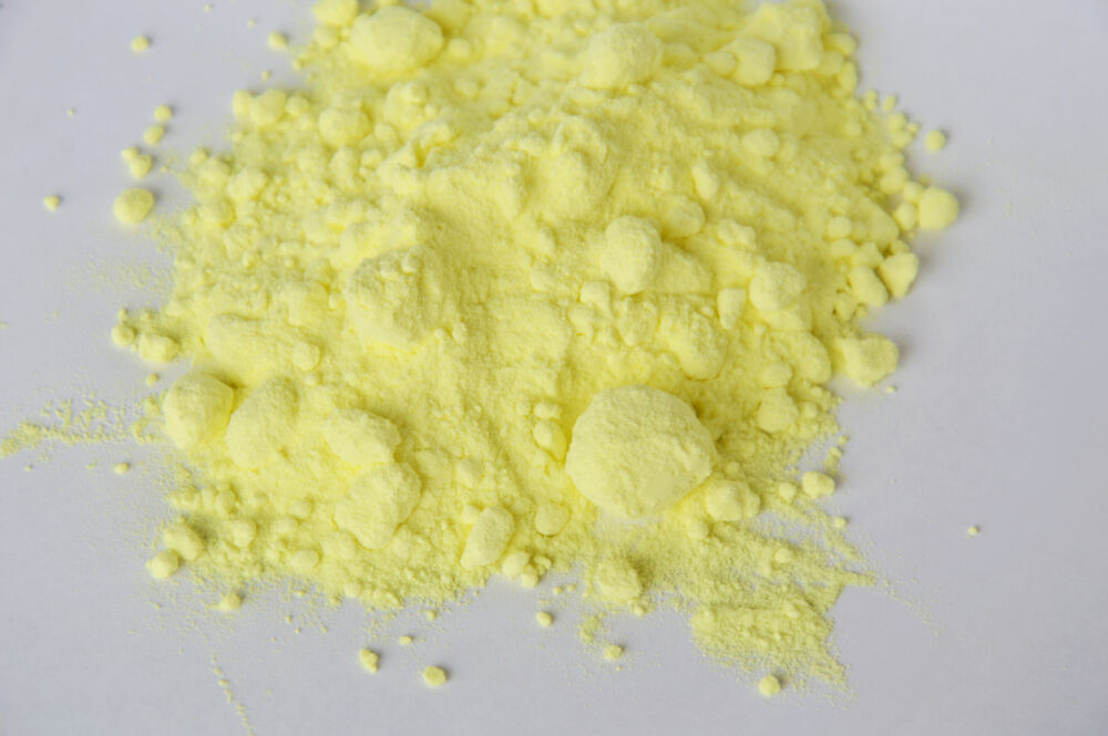sulfur powder on white paper